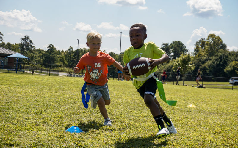 _DSC6985 Youth flag football players running with the ball