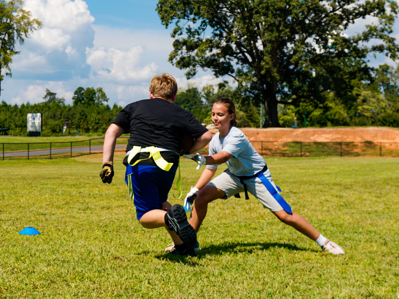 DSC7003.webp Flag football program for schools — students playing on campus